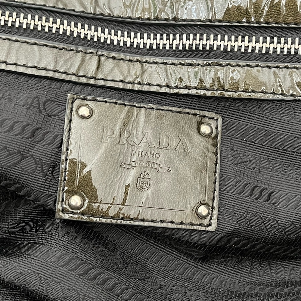 Vintage Prada Vernice Sfumata Bauletto Bag
Handles have decorative hardware. - Picture 15 of 15
